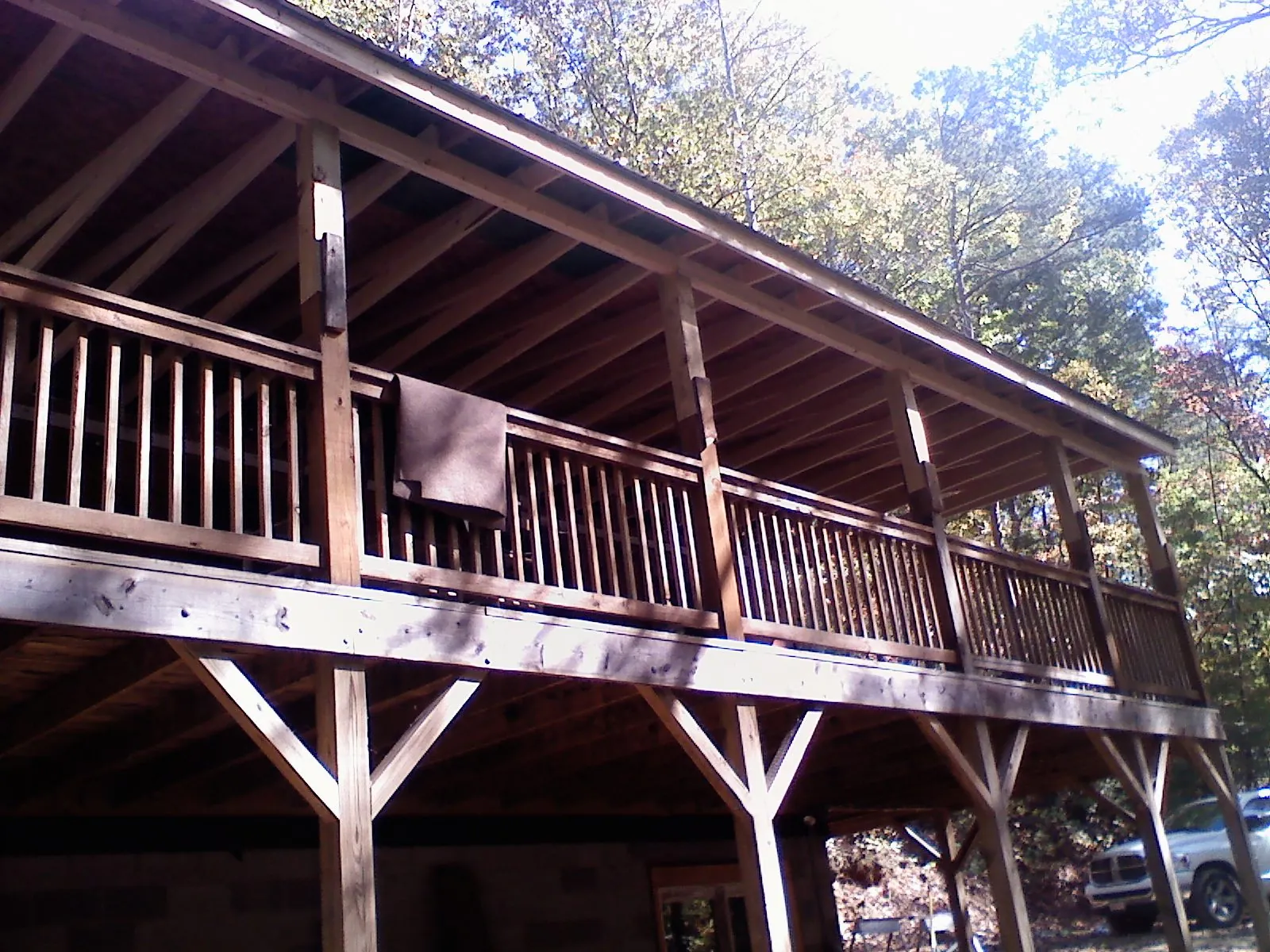 Timber framing under a new elevated porch and deck — Roof Leak Repair in Godley by Roofing Brothers